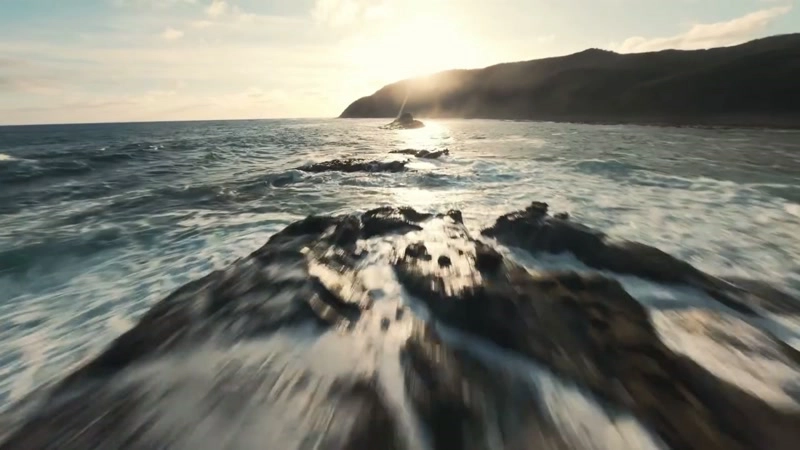 Riding the wind, overlooking the blue sea